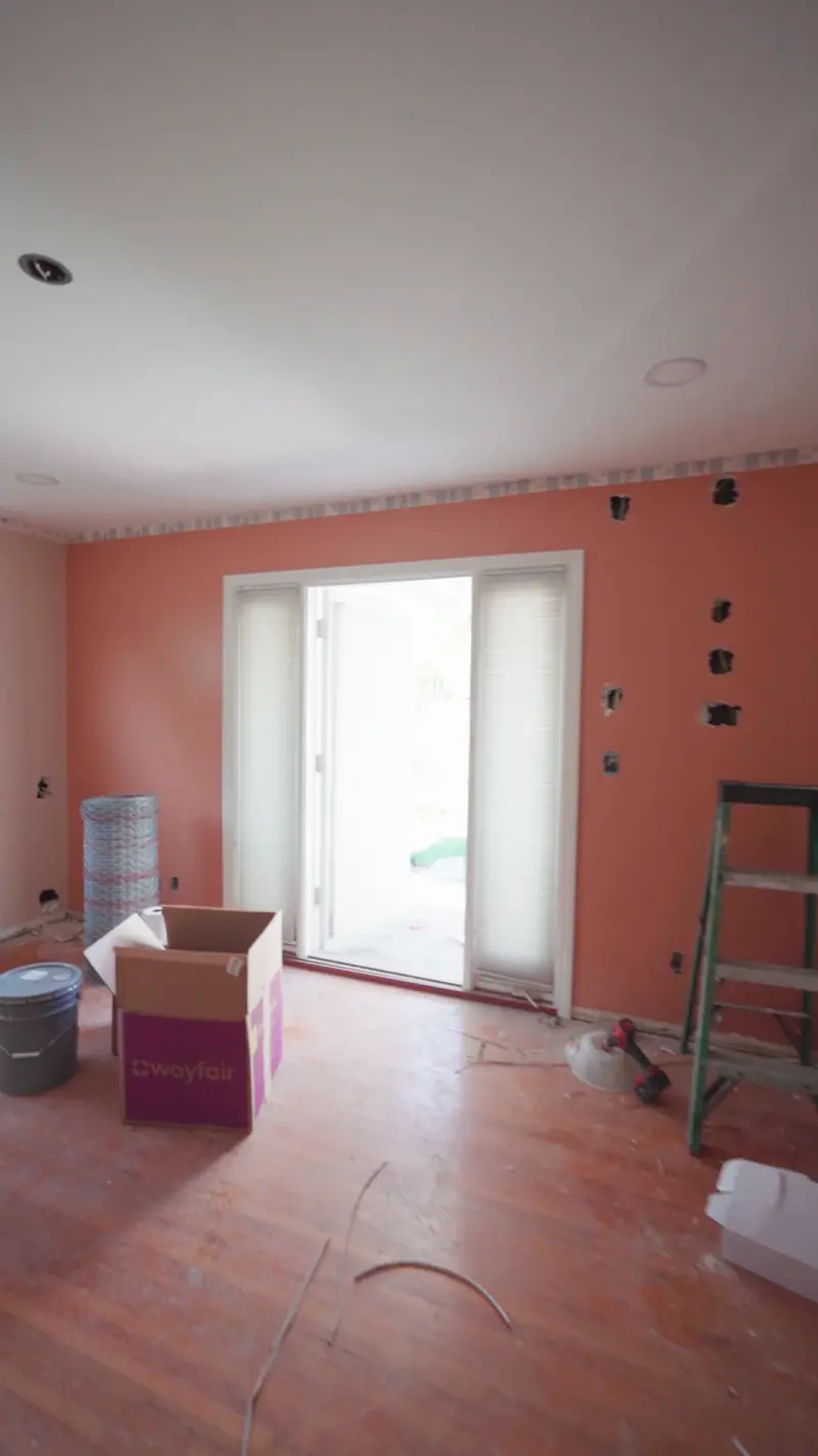 Primary bedroom cleared out with the French door open to the yard